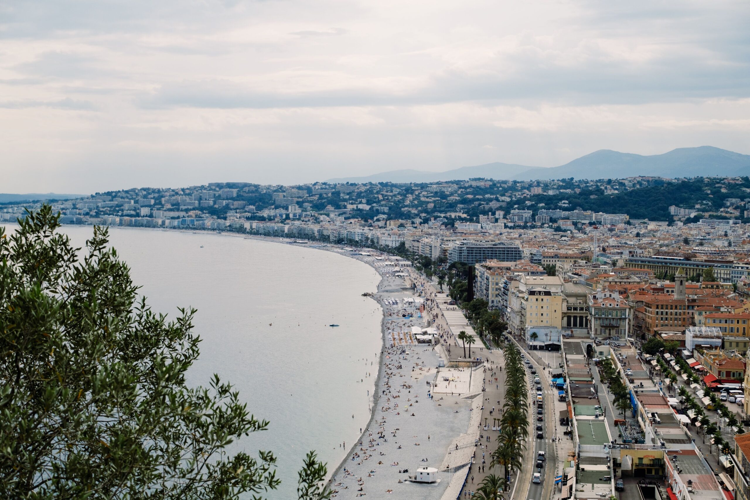 Stunning panoramic aerial view of Nice, showcasing the coastline and urban architecture.